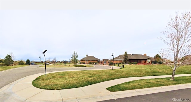 26267 E 3rd Ave, Aurora, CO 80018 - view of property's community with a lawn