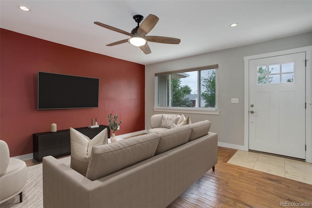 9743 W 67th Pl, Arvada, CO 80004 - living area with plenty of natural light, an accent wall, baseboards, recessed lighting, and ceiling fan