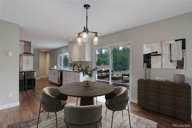 9743 W 67th Pl, Arvada, CO 80004 - dining area featuring dark wood-style floors, baseboards, and recessed lighting