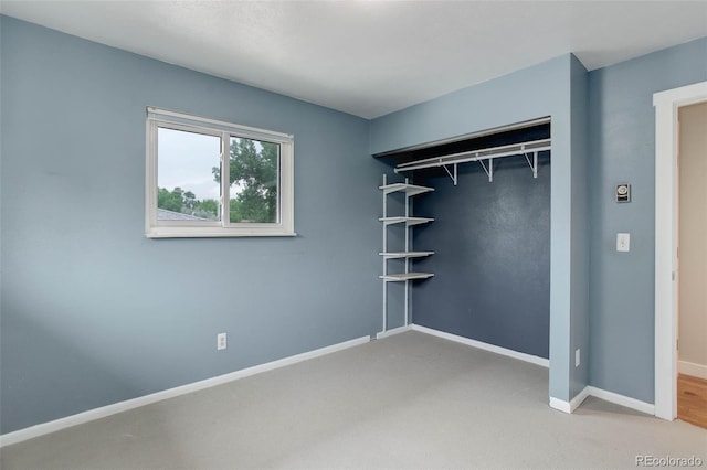 9743 W 67th Pl, Arvada, CO 80004 - unfurnished bedroom with baseboards, carpet flooring, and a closet