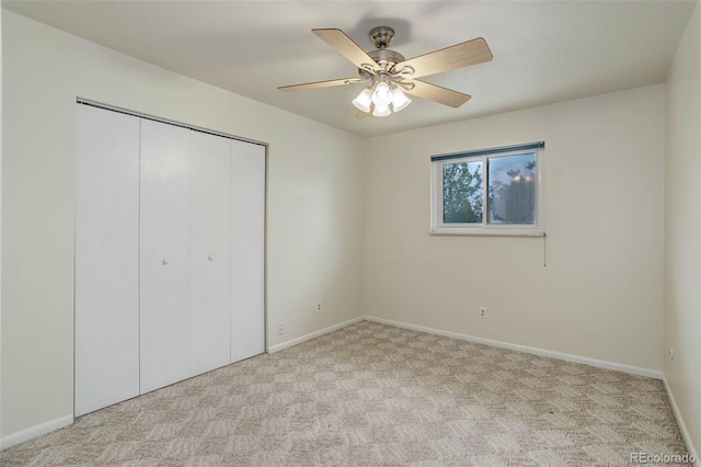 9743 W 67th Pl, Arvada, CO 80004 - unfurnished bedroom with a closet, carpet floors, baseboards, and ceiling fan