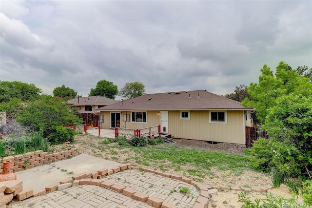 9743 W 67th Pl, Arvada, CO 80004 - back of property featuring a patio area and a deck