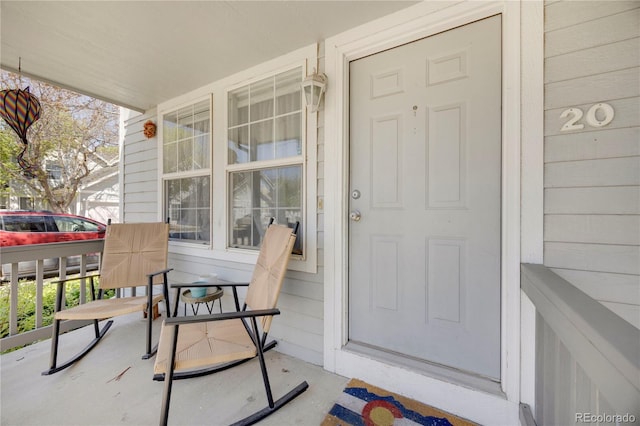 1115 W Swallow Rd Unit 20, Fort Collins, CO 80526 - doorway to property with covered porch