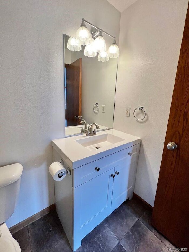 1115 W Swallow Rd Unit 20, Fort Collins, CO 80526 - half bathroom featuring toilet and vanity
