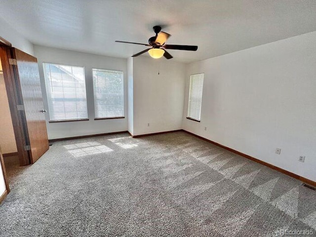 1115 W Swallow Rd Unit 20, Fort Collins, CO 80526 - carpeted spare room with a ceiling fan and baseboards
