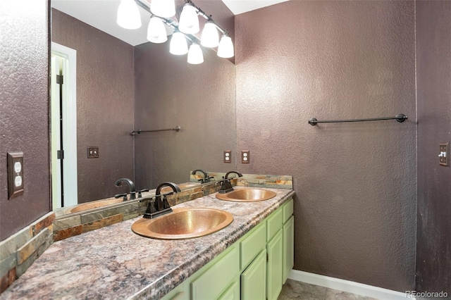 bathroom with vanity and a chandelier