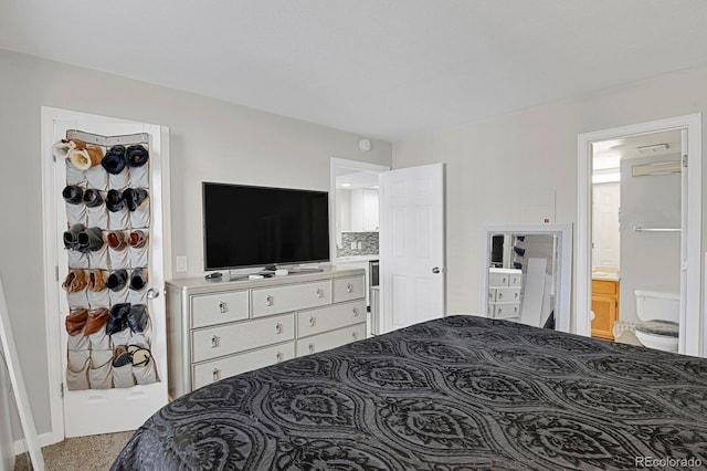 bedroom featuring ensuite bath