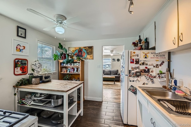 5424 Saulsbury Ct, Arvada, CO 80002 - kitchen with ceiling fan, plenty of natural light, and a sink