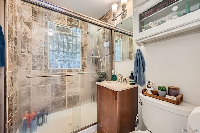 5424 Saulsbury Ct, Arvada, CO 80002 - full bath with toilet, a stall shower, and vanity