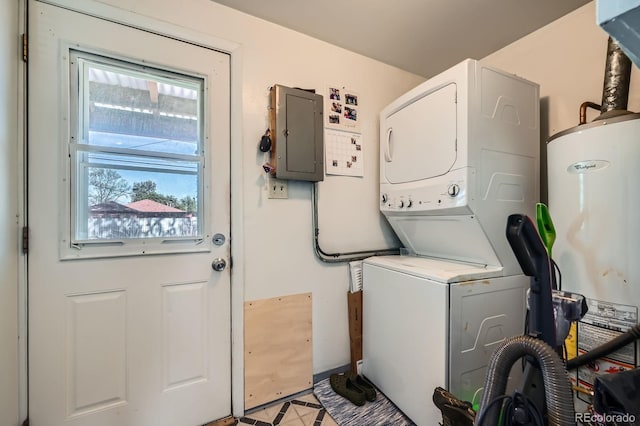 5424 Saulsbury Ct, Arvada, CO 80002 - washroom with estacked washer and dryer, gas water heater, and electric panel
