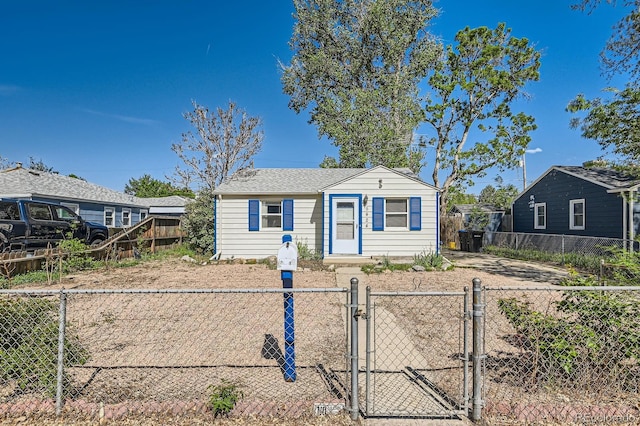 5424 Saulsbury Ct, Arvada, CO 80002 - view of front facade with a gate