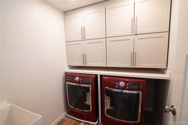 7600 S Ulster Ct, Centennial, CO 80112 - clothes washing area featuring separate washer and dryer, cabinet space, and baseboards