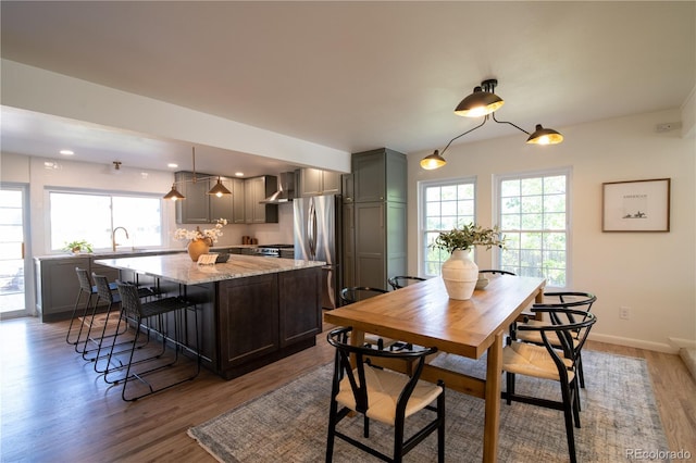 7600 S Ulster Ct, Centennial, CO 80112 - dining room with wood finished floors, baseboards, and recessed lighting