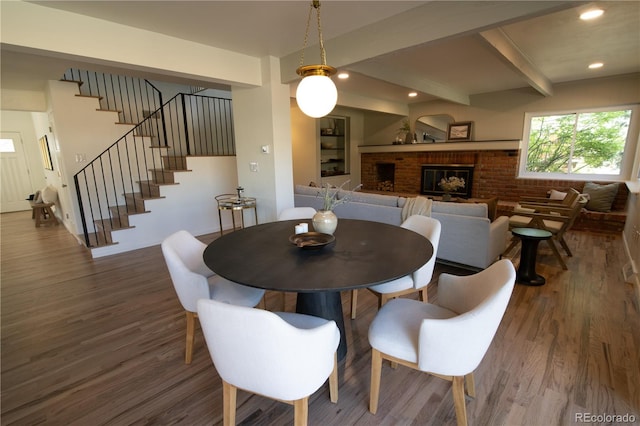 7600 S Ulster Ct, Centennial, CO 80112 - dining area featuring wood finished floors, stairs, a fireplace, beam ceiling, and recessed lighting