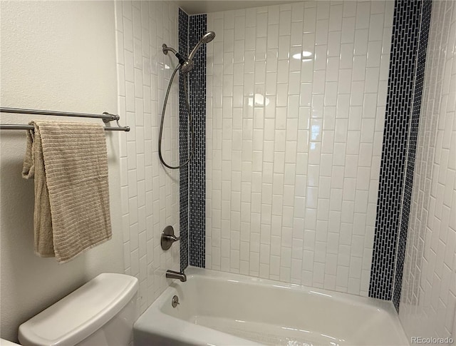 7600 S Ulster Ct, Centennial, CO 80112 - full bath with toilet, shower / washtub combination, and a textured wall
