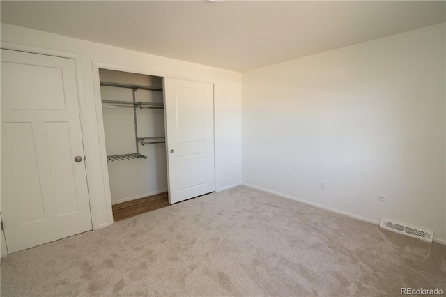 7600 S Ulster Ct, Centennial, CO 80112 - unfurnished bedroom featuring carpet, a closet, and baseboards