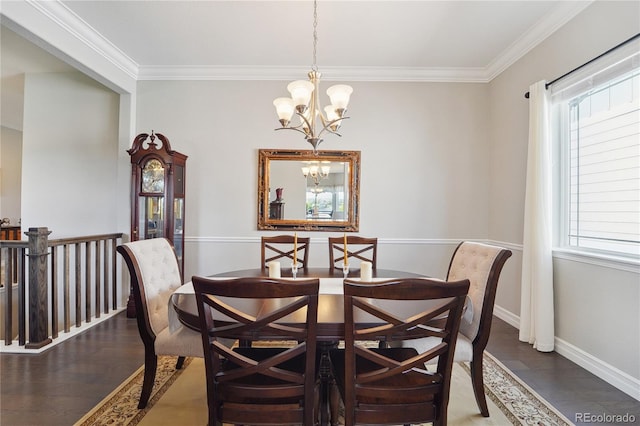 dining space with ornamental molding, dark hardwood / wood-style flooring, and a notable chandelier