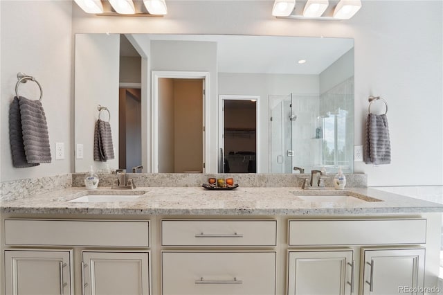 bathroom with vanity and walk in shower