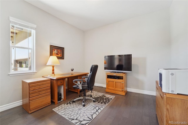 office with dark hardwood / wood-style floors