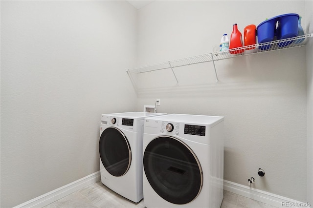 laundry area featuring washer and clothes dryer