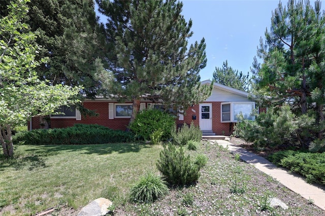 2900 S Golden Way, Denver, CO 80227 - view of front of property with brick siding and a front yard