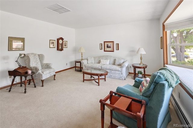 2900 S Golden Way, Denver, CO 80227 - carpeted living area featuring a baseboard radiator and baseboards