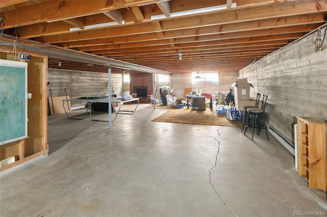 2900 S Golden Way, Denver, CO 80227 - below grade area featuring a baseboard radiator
