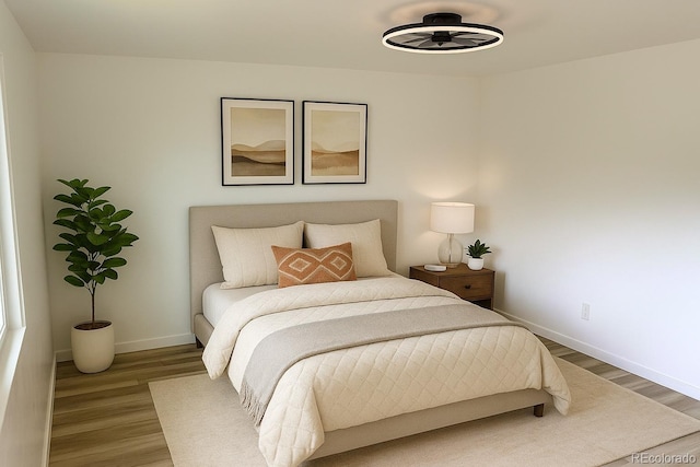 2218 Coronado Pkwy N Unit B, Denver, CO 80229 - bedroom featuring wood finished floors