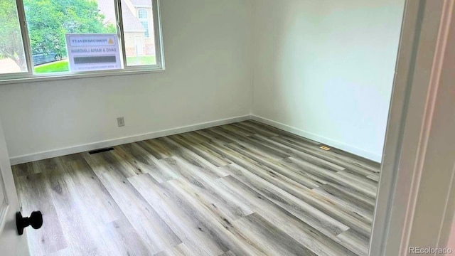 2218 Coronado Pkwy N Unit B, Denver, CO 80229 - empty room with wood finished floors