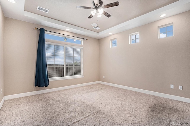 5521 Ensenada St, Denver, CO 80249 - carpeted empty room with a tray ceiling, baseboards, ceiling fan, and recessed lighting