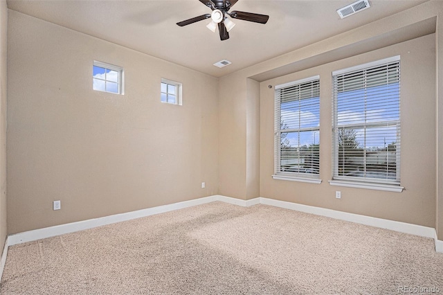 5521 Ensenada St, Denver, CO 80249 - carpeted spare room with baseboards and a ceiling fan
