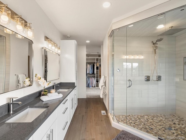 43 Falcon Hills Dr, Highlands Ranch, CO 80126 - full bathroom featuring recessed lighting, a shower stall, and a sink