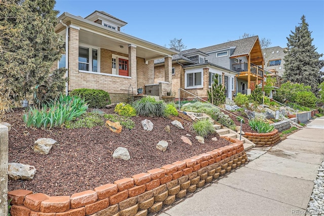 3259 Lowell Blvd, Denver, CO 80211 - view of front of property with brick siding and a porch