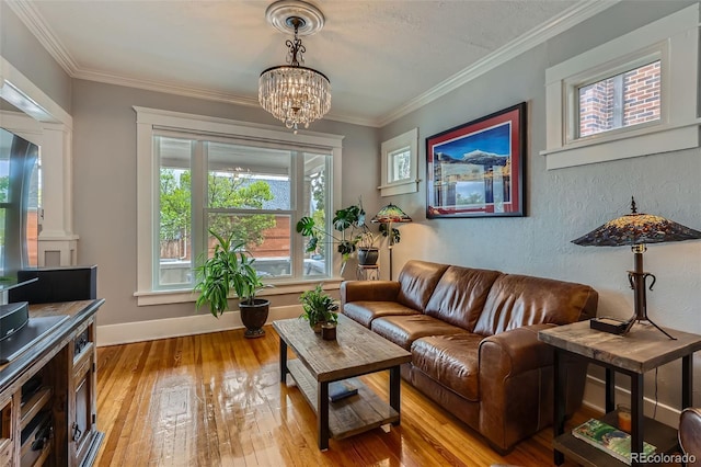 3259 Lowell Blvd, Denver, CO 80211 - living area with light wood-style floors, a chandelier, and crown molding