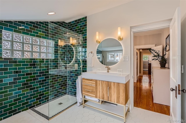 3259 Lowell Blvd, Denver, CO 80211 - bathroom featuring walk in shower, vanity, tile patterned floors, and recessed lighting