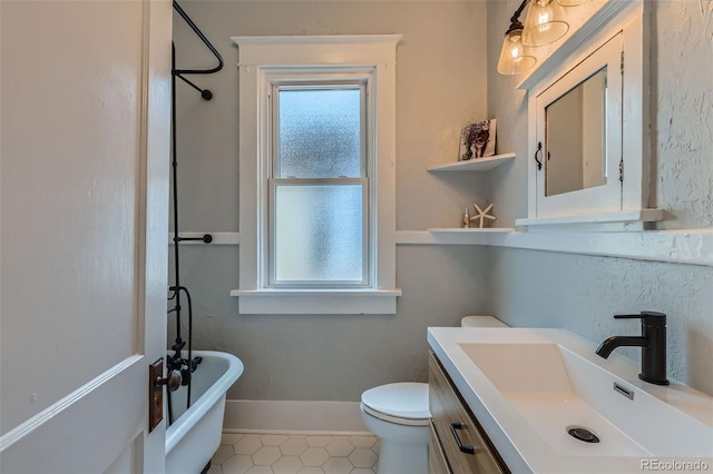 3259 Lowell Blvd, Denver, CO 80211 - bathroom with healthy amount of natural light, a freestanding bath, and vanity