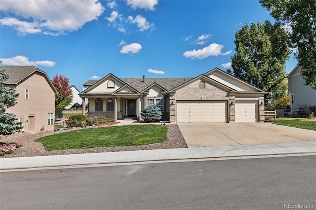 view of front of house featuring a garage, brick siding, fence, concrete driveway, and a front yard