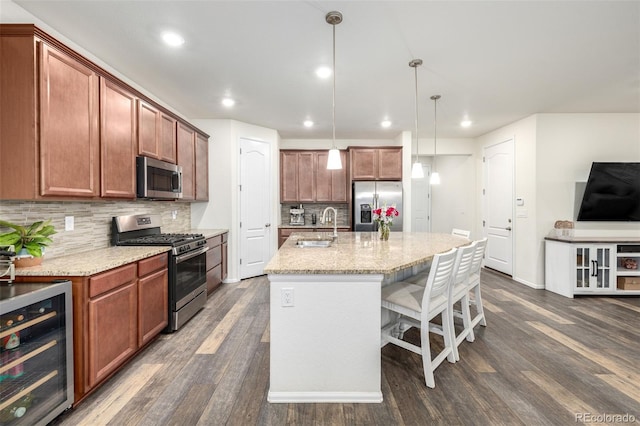9723 Bennett Peak St, Littleton, CO 80125 - kitchen featuring beverage cooler, stainless steel appliances, dark wood-type flooring, a sink, and backsplash