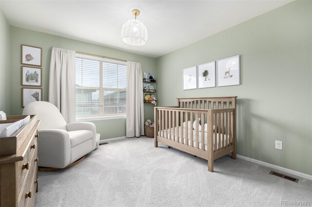 9723 Bennett Peak St, Littleton, CO 80125 - bedroom featuring carpet, baseboards, and a nursery area