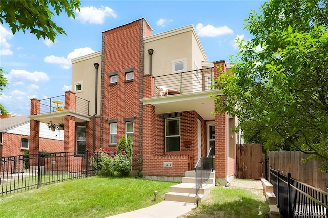 4414 Wolff St, Denver, CO 80212 - view of front of house featuring brick siding, stucco siding, and a balcony
