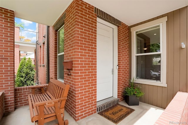 4414 Wolff St, Denver, CO 80212 - entrance to property featuring brick siding and a porch
