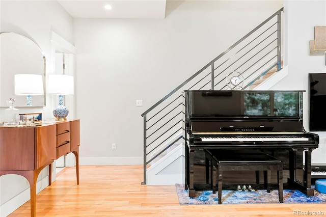 4414 Wolff St, Denver, CO 80212 - sitting room featuring stairs, wood finished floors, and recessed lighting