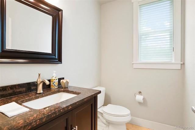 4414 Wolff St, Denver, CO 80212 - half bathroom with vanity and toilet
