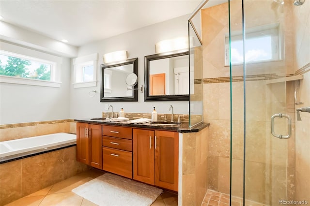4414 Wolff St, Denver, CO 80212 - bathroom featuring tile patterned floors, a stall shower, a garden tub, and double vanity