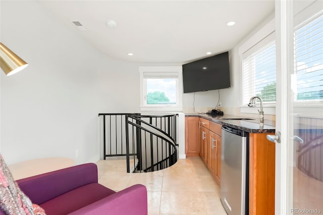 4414 Wolff St, Denver, CO 80212 - bar area with dishwasher, healthy amount of natural light, light tile patterned floors, and recessed lighting