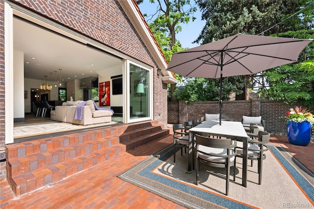 3309 E 7th Avenue Pkwy, Denver, CO 80206 - view of patio featuring entry steps and outdoor dining area