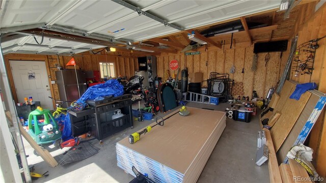 garage featuring freestanding refrigerator