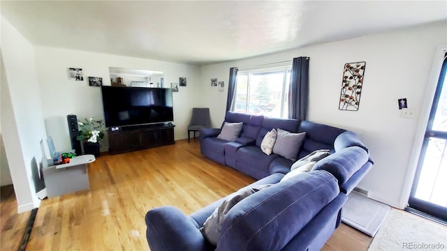 7620 Hooker St, Westminster, CO 80030 - living room with plenty of natural light and wood finished floors