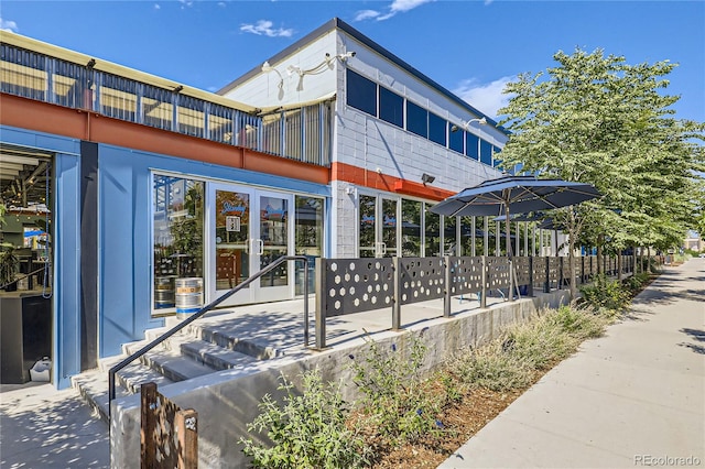 view of property exterior with fence