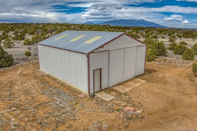 view of outdoor structure featuring a mountain view